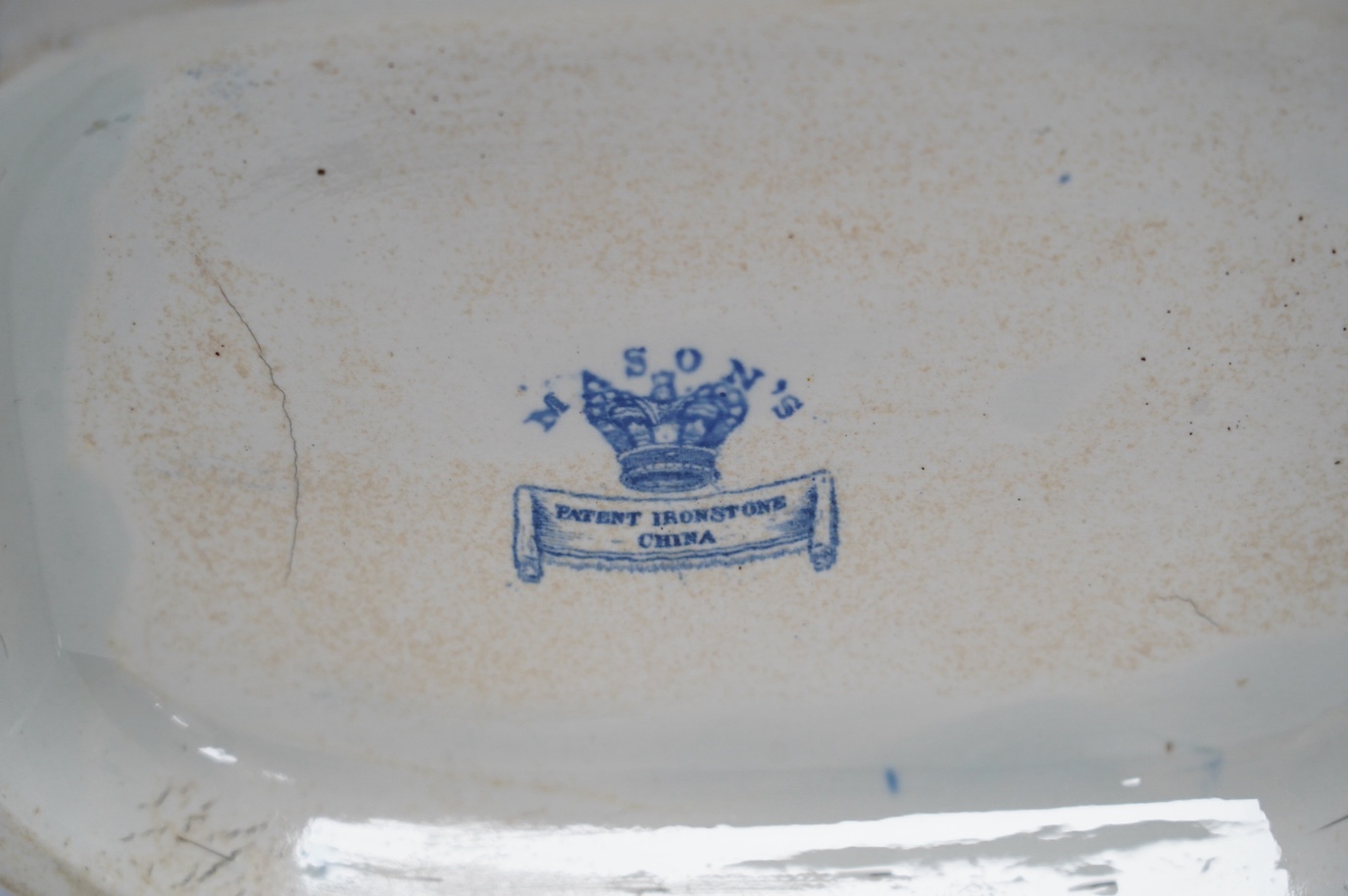 A Victorian Staffordshire blue and white pottery soup tureen and cover, together with a meat dish (2). Condition - tureen cover cracked